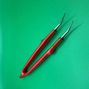 Bent Nose Tweezers by Amati with a rubber handle image 0