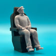 Captains Sitting in his Black Seat image 0