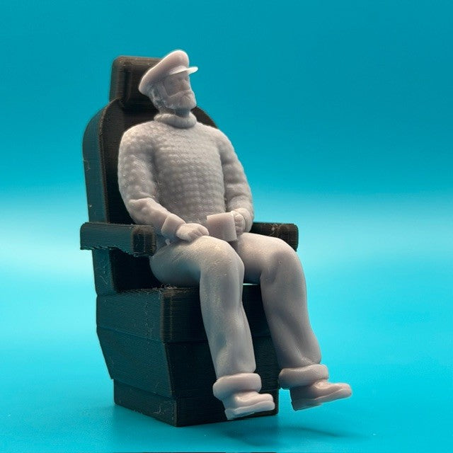 Captains Sitting in his Black Seat image 0