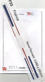 Two small rectangular labels with text and a logo on a white background