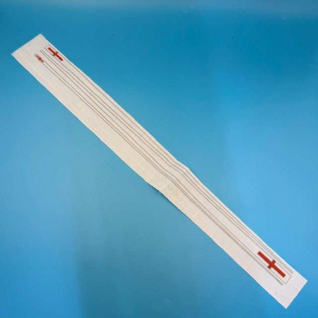 Strip of adhesive bandages with red crosses on a blue background