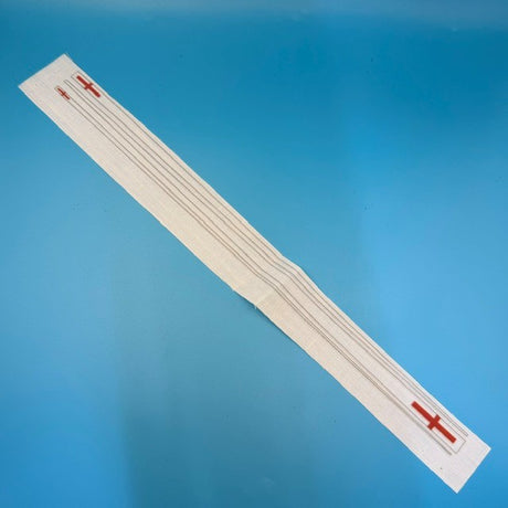 Strip of adhesive bandages with red crosses on a blue background