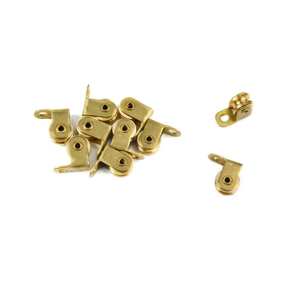 A set of small brass zipper pull tabs and matching metal zipper teeth pieces arranged on a plain white background.