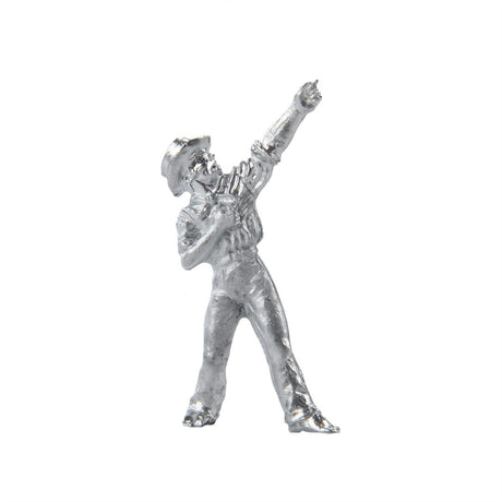 A small metallic silver figurine of a dancing figure, captured against a solid white background.