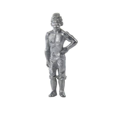 A metallic silver figurine of a muscular male figure wearing a knit beanie, standing with one hand on his hip, isolated on a white background.