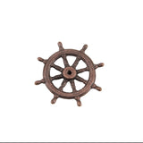 A single ship's wheel decorative piece or hardware charm in a distressed bronze-brown finish, isolated on a solid white background.